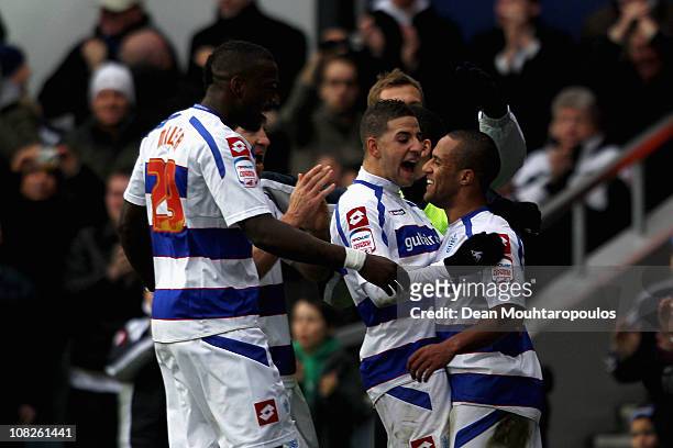 Wayne Routledge of QPR is congratulated by team mates after he scores the winning goal in the npower Championship match between Queens Park Rangers...