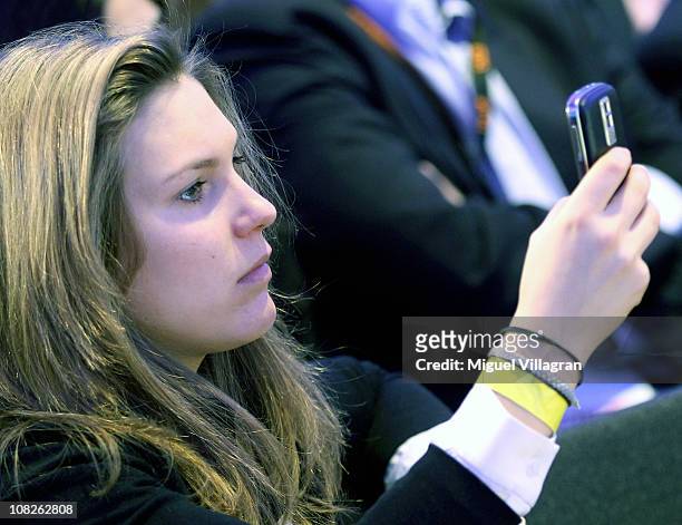 Elisabeth Burda, the daughter of publisher and DLD-Co-Chairman Hubert Burda takes a picture with her cellular phone during the Digital Life Design...