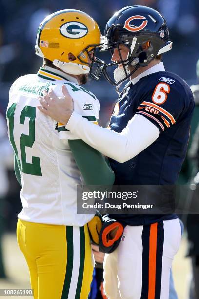 Quarterback Aaron Rodgers of the Green Bay Packers and quarterback Jay Cutler of the Chicago Bears shake hands before the NFC Championship Game at...