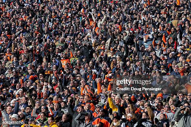 Fans cheer in the NFC Championship Game between the Green Bay Packers and the Chicago Bears at Soldier Field on January 23, 2011 in Chicago, Illinois.