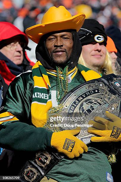 Green Bay Packers fan looks on from the stands as the Packers take on the Chicago Bears during the NFC Championship Game at Soldier Field on January...