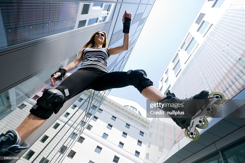 Mature woman rollerblading