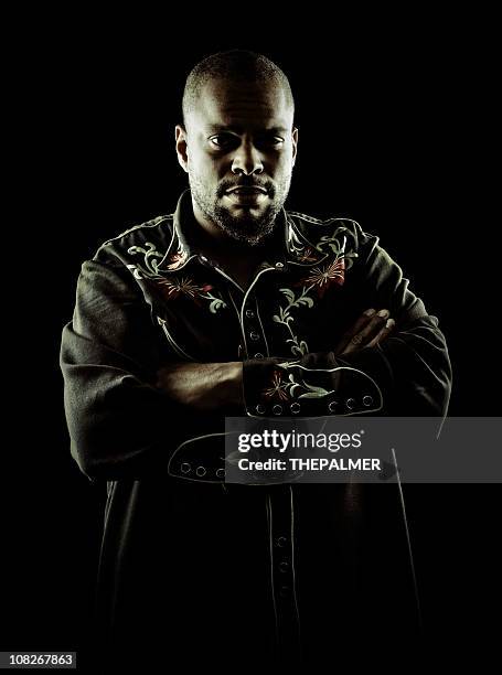 young man with crossed arms - nightclub security stock pictures, royalty-free photos & images