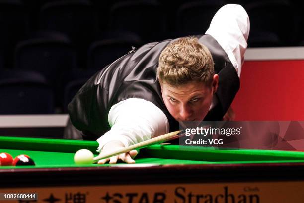 Daniel Wells of Wales plays a shot during his quarter-final match against Ryan Day of Wales on day five of 2018 BetVictor Scottish Open at Emirates...