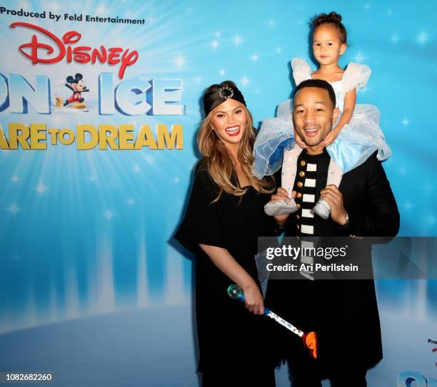 Chrissy Teigen, John Legend and daughter Luna attend Disney On Ice Presents Dare to Dream Celebrity Skating Party at Staples Center on December 14,...