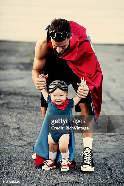 baby superhero - baby superhero stock pictures, royalty-free photos & images