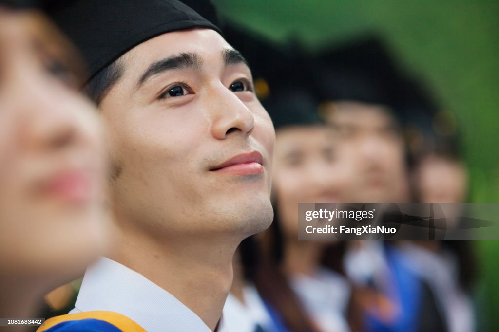 Chinese graduates in caps and gowns