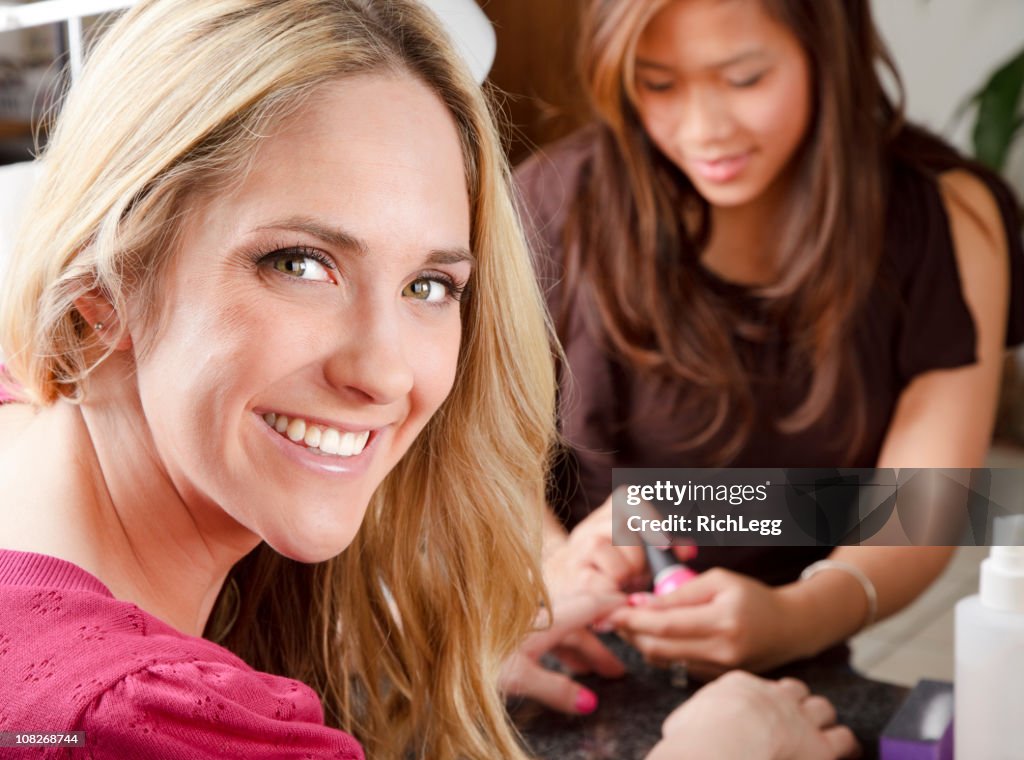 Woman Getting a Manicure