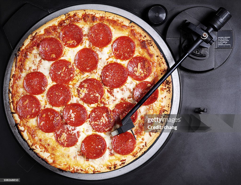 Pepperoni Pizza on Record Player Turntable