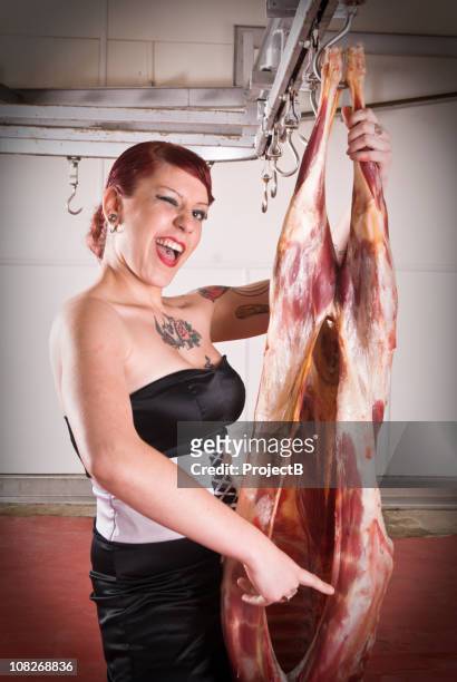 woman holding slaughtered lamb - tattoo shoulder stock pictures, royalty-free photos & images