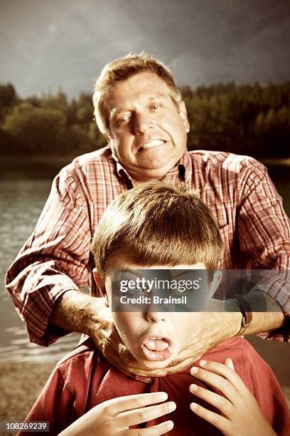 angry dad - strangling stock pictures, royalty-free photos & images