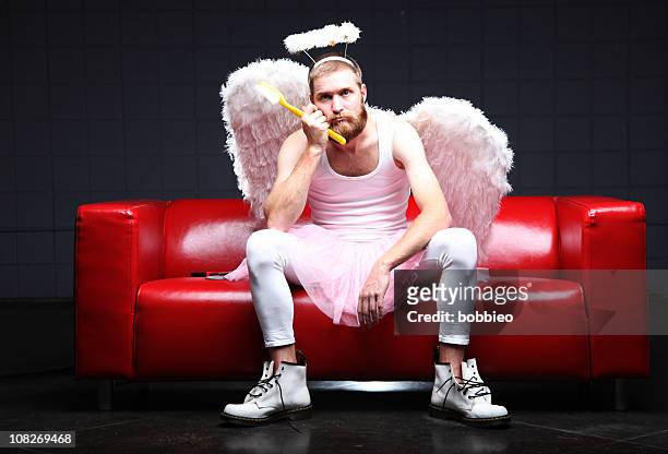 tooth fairy: bored and waiting - angel pink stock pictures, royalty-free photos & images