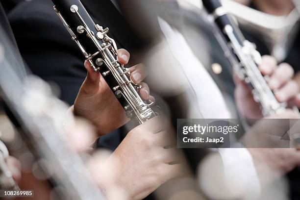 close-up of clarinets playing in an orchestra with shallow dof - klarinett bildbanksfoton och bilder
