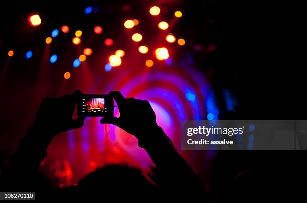 taking picture at live concert - digital camera stock pictures, royalty-free photos & images