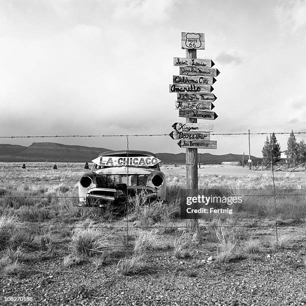 old abandoned american car in the desert along route 66 - route 66 stock pictures, royalty-free photos & images