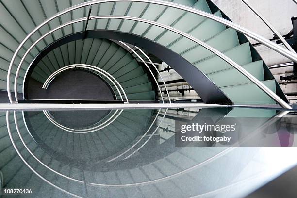 modern spiral staircase with metal railing - architectural stock pictures, royalty-free photos & images