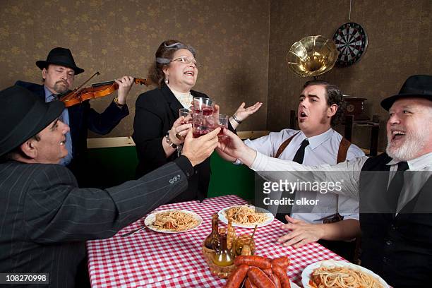 italian family celebration - female gangster stock pictures, royalty-free photos & images