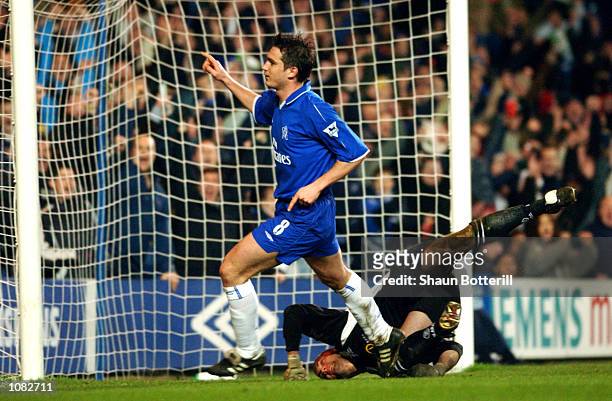 Frank Lampard of Chelsea celebrates scoring the second goal of the match during the AXA sponsored FA Cup third round replay match against Norwich...