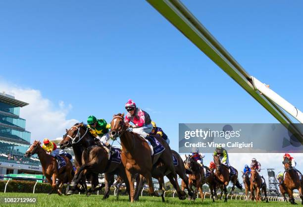 Ethan Brown riding Crafty Devil defeats Stephen Baster riding Mazaz in Race 8, Make-A-Wish Australia Trophy during Melbourne Racing at Flemington...