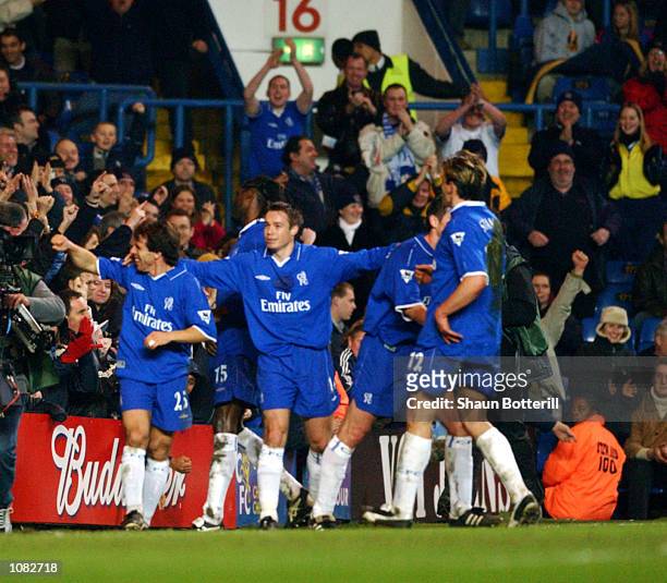 Gianfranco Zola of Chelsea celebrates scoring one of the best goals ever seen in football with team-mates during the AXA sponsored FA Cup third round...