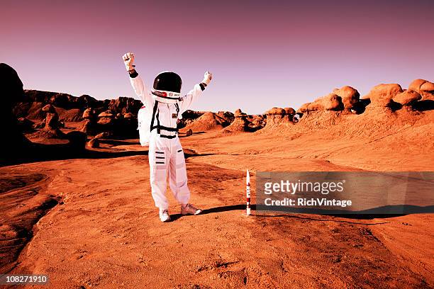 mission accomplished! - cosmonaut stock pictures, royalty-free photos & images
