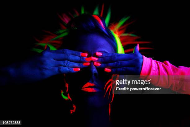 neon glow portrait - uv light stock pictures, royalty-free photos & images