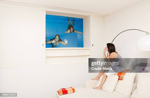 human fishbowl - underwater room stock pictures, royalty-free photos & images