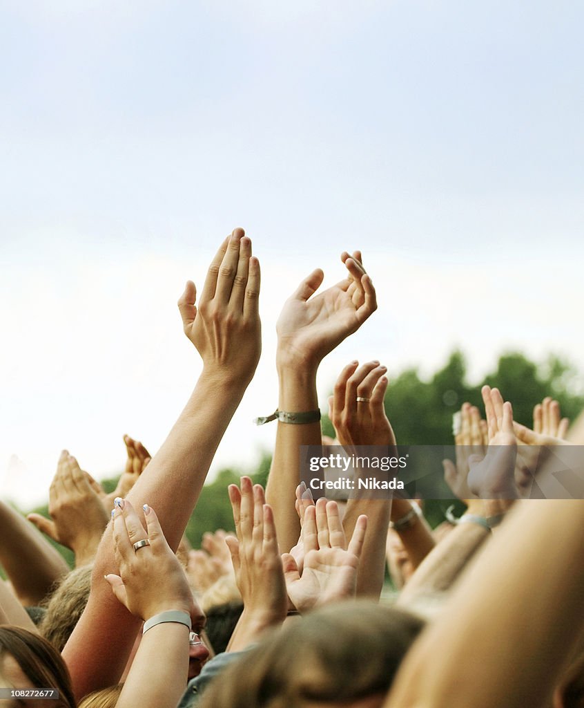 Hands Clapping in Crown Outdoors