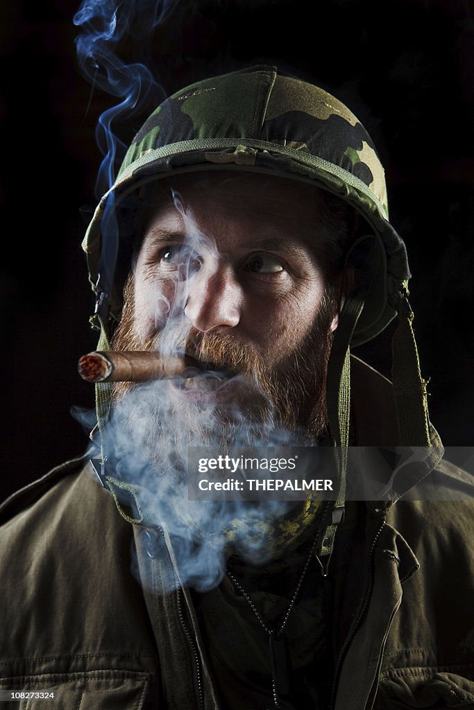 Army officer smoking a cigar