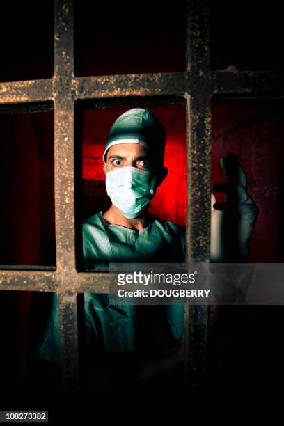 scary doctor - crazy doctor stock pictures, royalty-free photos & images