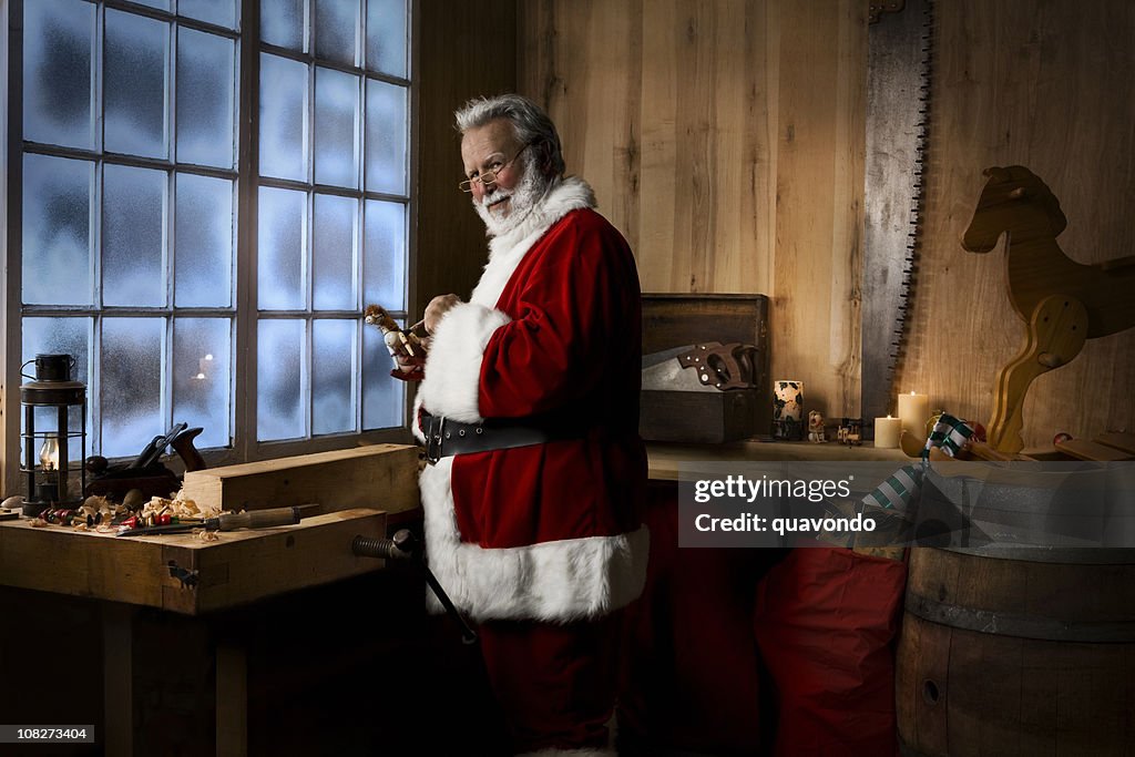 Antique Toy Making Shop with Santa Claus on Winter Night