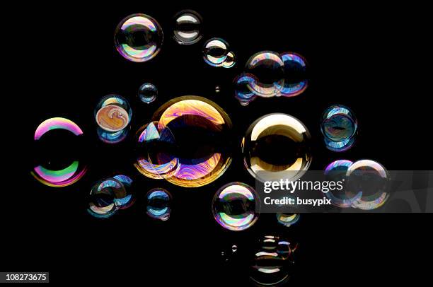 bubbles against black background  - black colour 個照片及圖片檔