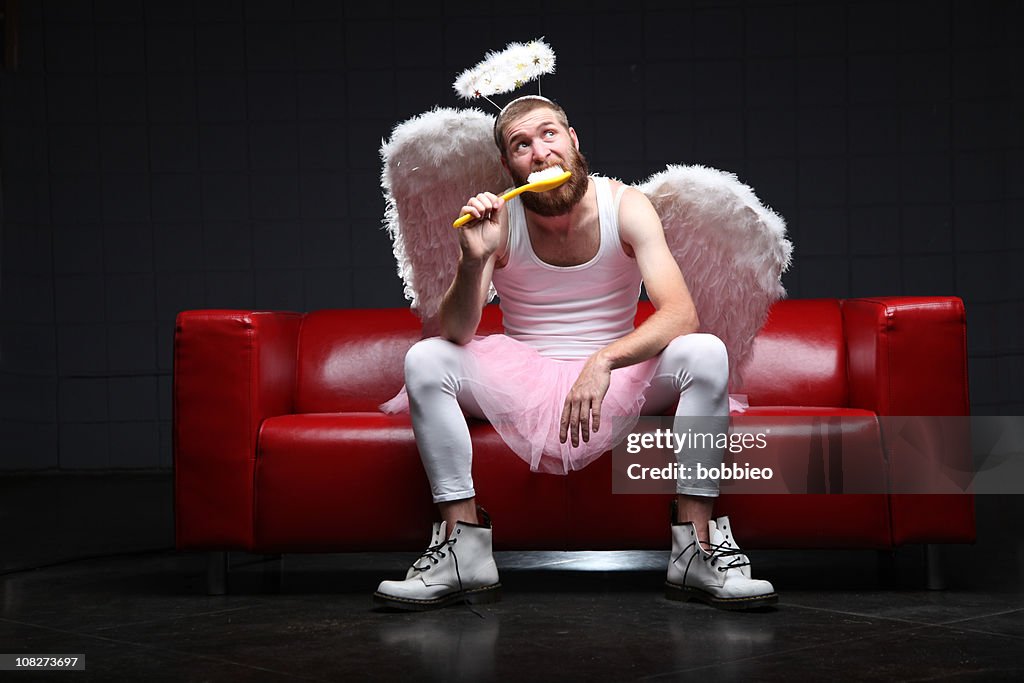Tooth Fairy: brushing teeth with giant toothbrush