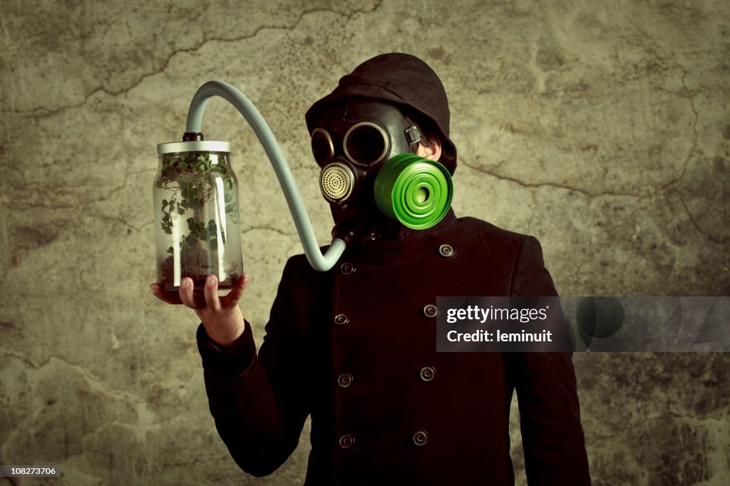 Man breathing from the last tree of Earth