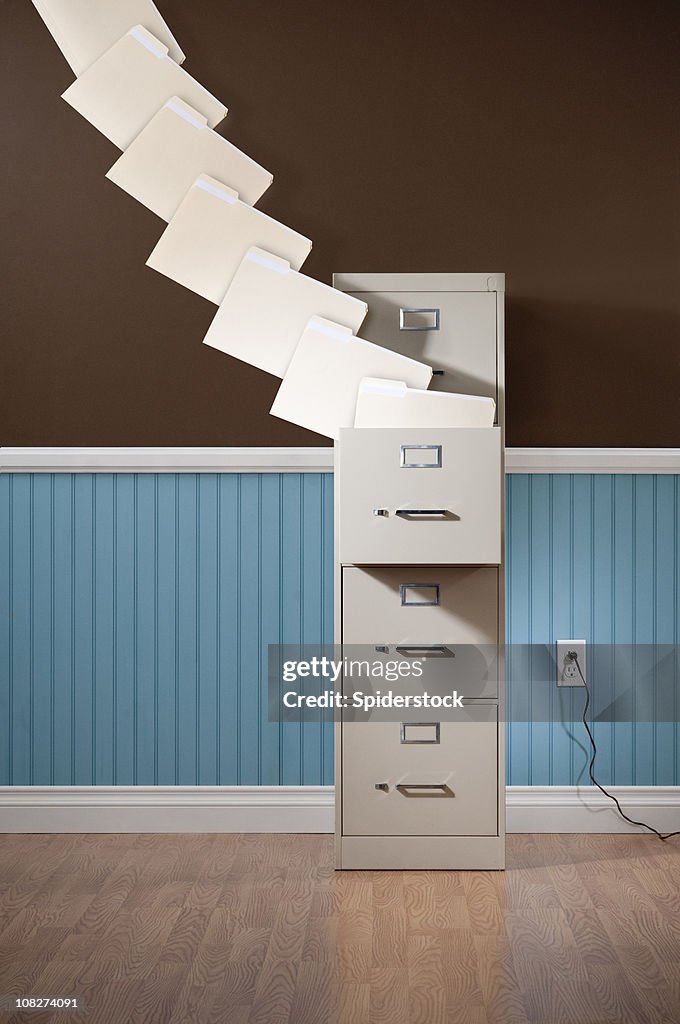 File Cabinet With Flying Folders.