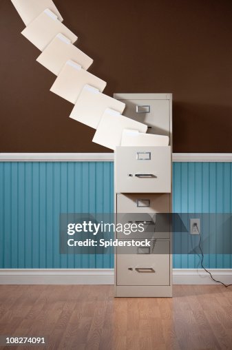 Flying File Cabinets File Cabinet With Flying Folders High-Res Stock Photo - Getty Images