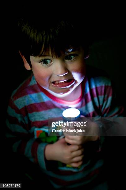 Kids Scary Flashlight Photos and Premium High Res Pictures - Getty Images