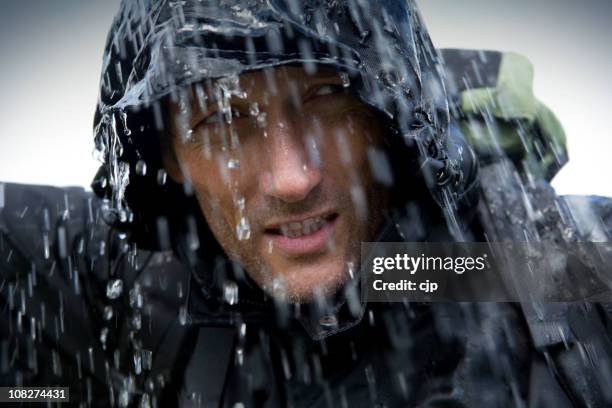 hiker in heavy rain storm - regnkläder bildbanksfoton och bilder