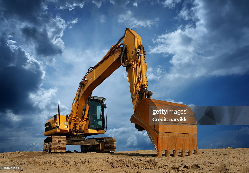 Local de construção em amarelo Excavator