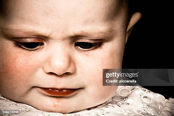 baby looking down - baby pout stock pictures, royalty-free photos & images