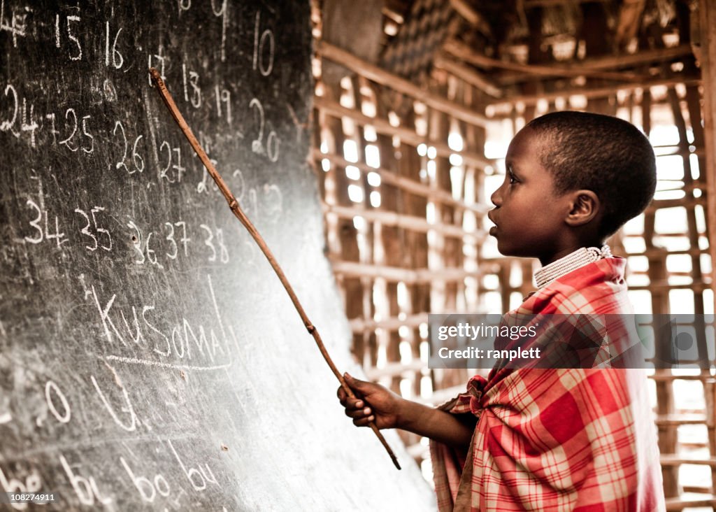 African Child Learning Numbers at School