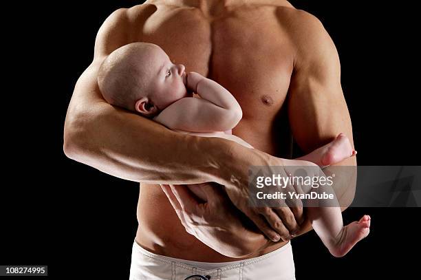 baby boy in daddy arms(baby boy) - male chest stock pictures, royalty-free photos & images