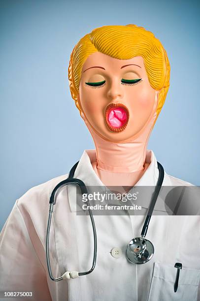 blow-up doll dressed as doctor with stethoscope - blow up doll 個照片及圖片檔