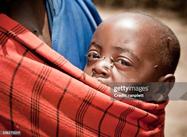 mother and her child in africa - 1 year poor african boy stock pictures, royalty-free photos & images