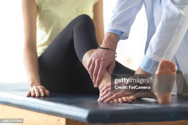 sprained ankle - sprain stock pictures, royalty-free photos & images