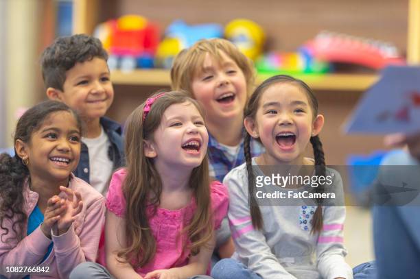 active storytelling - nursery school child stock pictures, royalty-free photos & images
