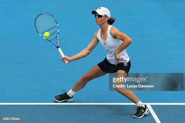 Cara Black of Zimbabwe plays a forehand in her third round doubles match with Anastasia Rodionova of Australia against Raquel Kops-Jones and Abigail...