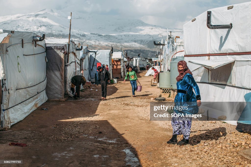 As temperatures plummet, refugees prepare for another storm...