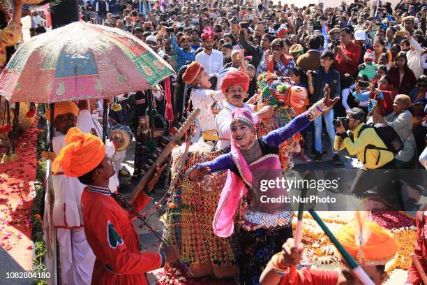 Rajasthani folk artists perform during Kite Festival on the occasion of Makar Sankranti at Jal Mahal in Jaipur,Rajasthan,India ,Jan 14,2019.