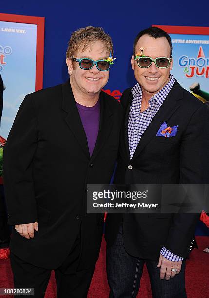 Elton John and David Furnish arrive at the "Gnomeo And Juliet" Los Angeles Premiere at the El Capitan Theatre on January 23, 2011 in Hollywood,...